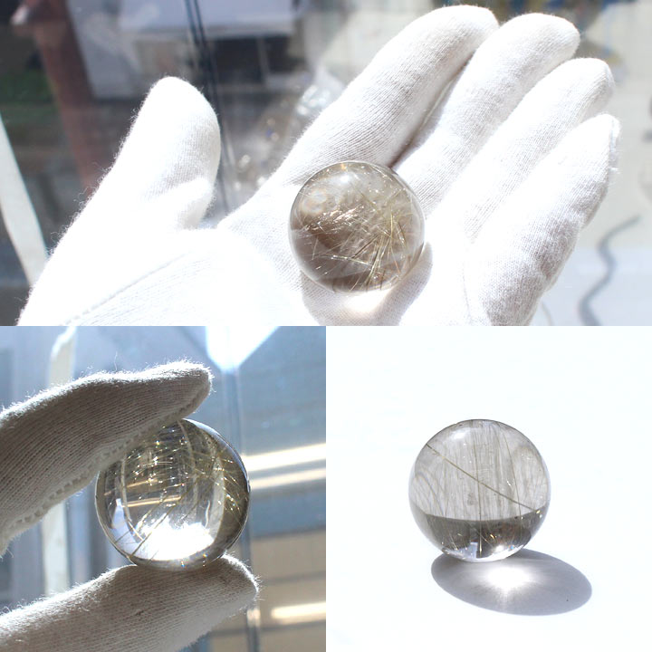 ルチルクォーツ 25-28mm球 丸玉 （天然石 パワーストーン スフィア 球体）手に持ったイメージ